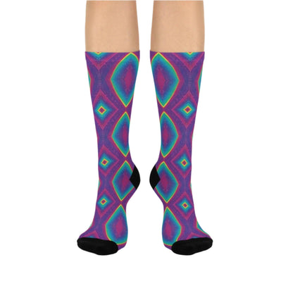 Cosmic Galaxy Socks featuring bold purple, teal, and pink geometric patterns with contrasting black heel, toe, and cuff