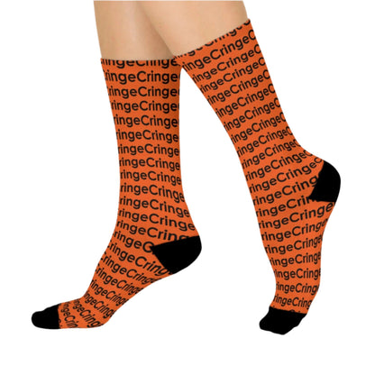 Bold crew socks featuring a repeating 'Cringe' text pattern in vibrant orange with black accents on the toe, heel, and cuff. Perfect for adding a playful edge to any outfit, from The Killer Tee.