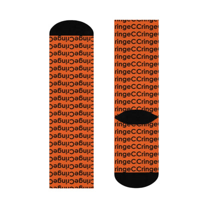 Bold crew socks featuring a repeating 'Cringe' text pattern in vibrant orange with black accents on the toe, heel, and cuff. Perfect for adding a playful edge to any outfit, from The Killer Tee.